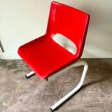 Chaise enfant en métal blanc et plastique rouge