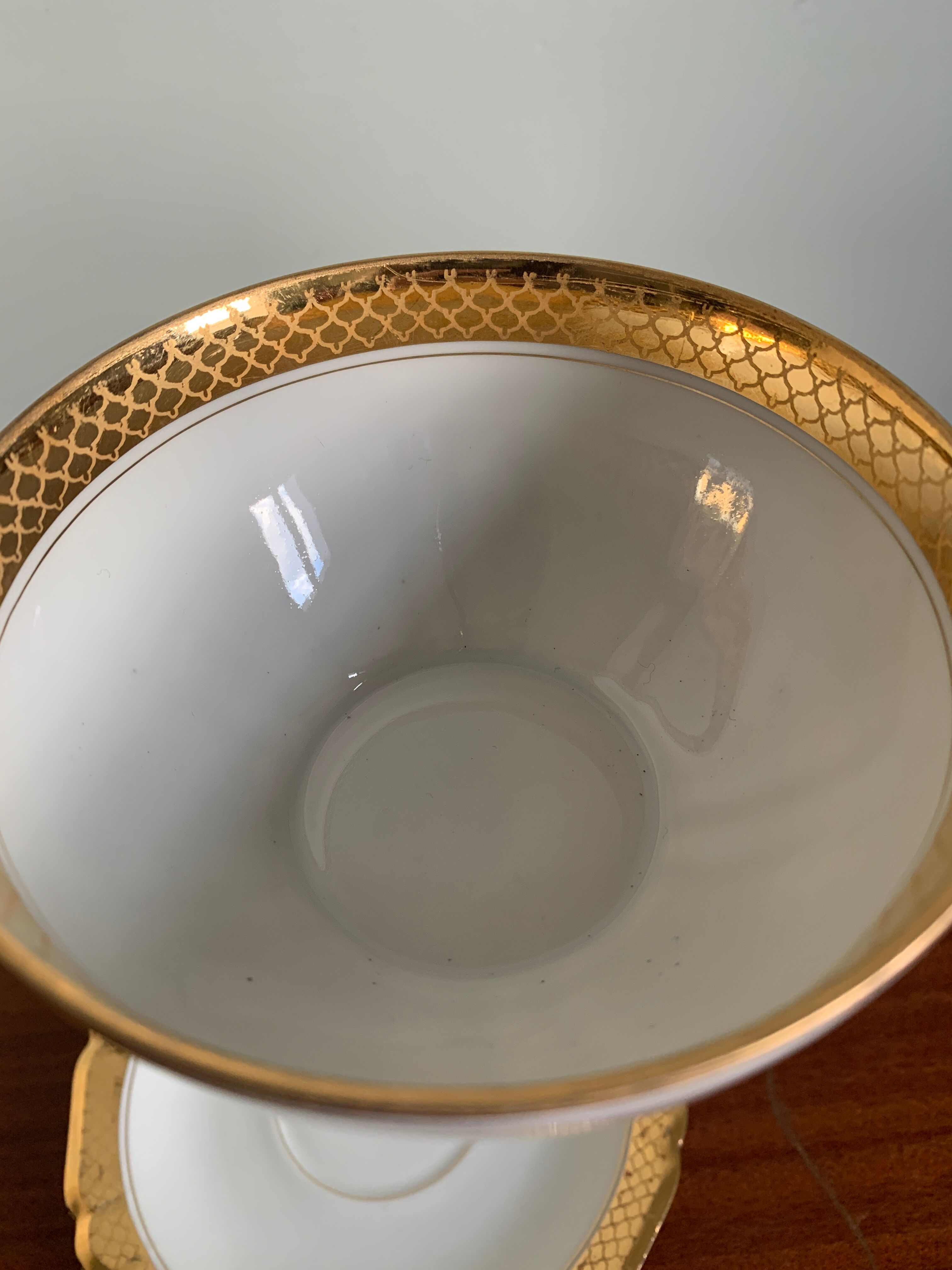 Pair of gold porcelain tea cups