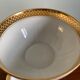 Pair of gold porcelain tea cups