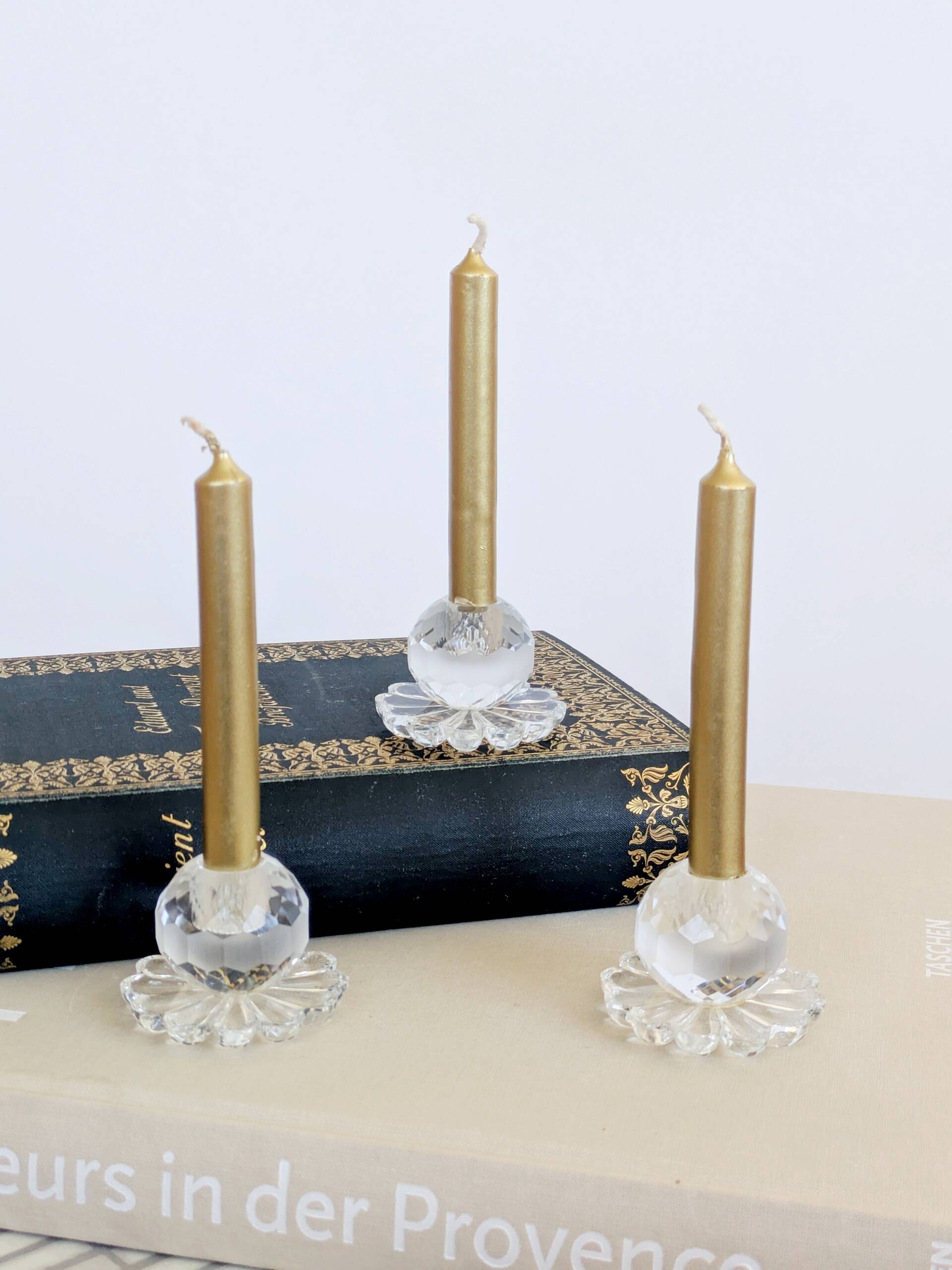 Lot of 3 vintage faceted crystal candle holders with flower base for slim candles.