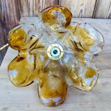 Suspension forms tulip in Murano glass has coppery edge.