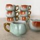 Calvados liqueur cups in slip, 1940s