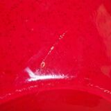 Pot-bellied, art deco vase in speckled ruby red multi-layered glass, white interior