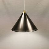 Cone pendant produced by Danish Lyfa in beautiful black lacquer with perforated shade and brass top.