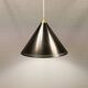 Cone pendant produced by Danish Lyfa in beautiful black lacquer with perforated shade and brass top.
