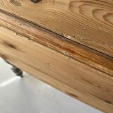 Round wooden table with flaps