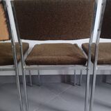 Five chairs in chromed metal and mottled fabric