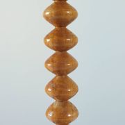Vintage mid-century wooden candlestick, spool decoration from the 1970s.