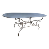 Grande table ovale en fer forgé – plateau restauré – 200 x 90 cm