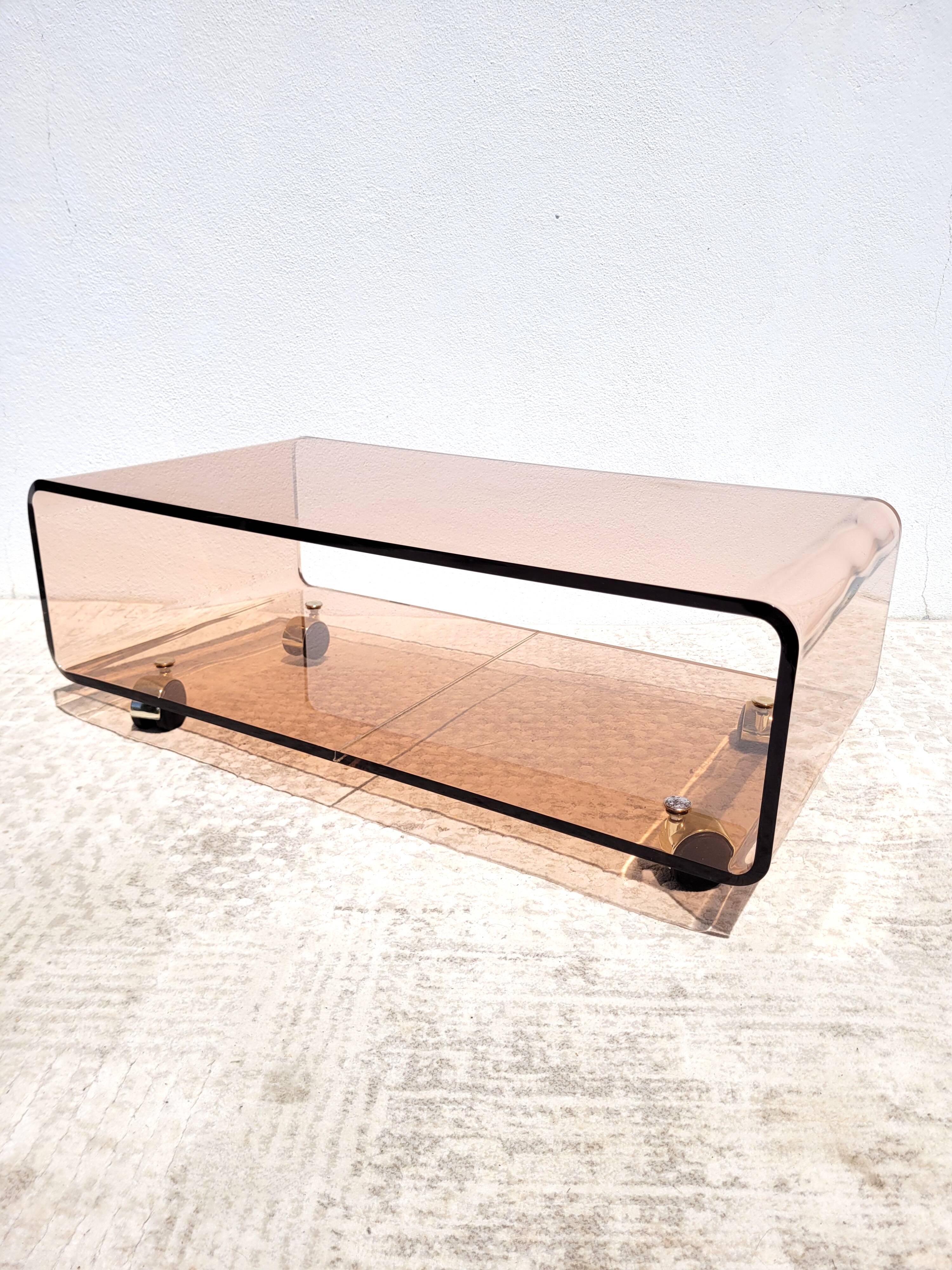 Vintage plexiglass coffee table with wheels 1970