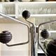 Space Age coat rack with 8 hooks in chrome-plated metal and brown bakelite