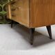 Vintage low enfilade from the 50s/60s – sculptural handles & tapered legs