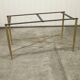 Marble coffee table with brass legs, height 46 cm.