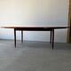 Rectangular extendable dining table with Scandinavian design in teak.