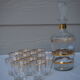 Golden liqueur service from the 1950s-1960s and its 12 glasses.