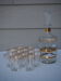 Golden liqueur service from the 1950s-1960s and its 12 glasses.