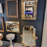 Mirror with parecloses