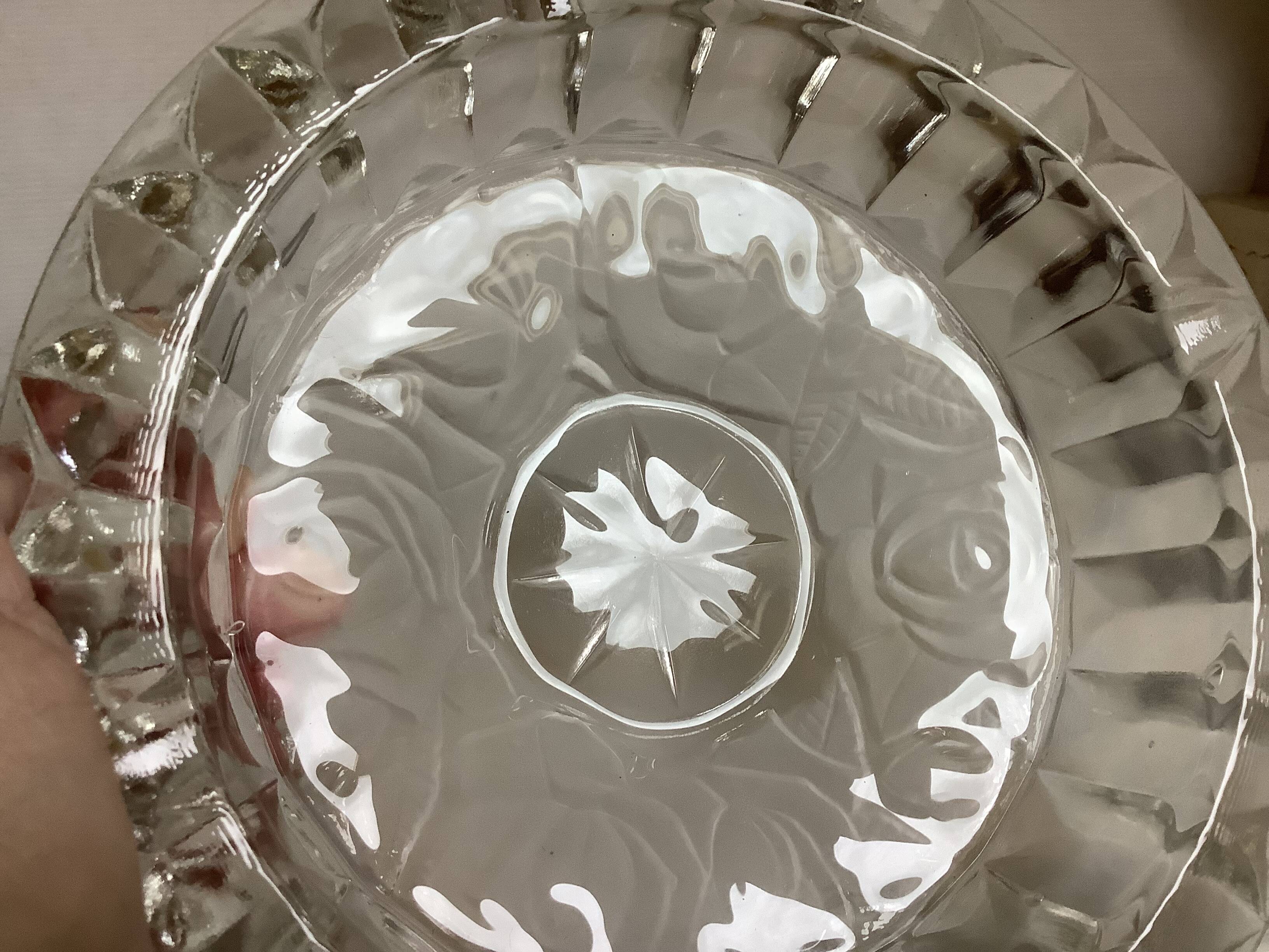 Large glass ashtray with frosted flowers.