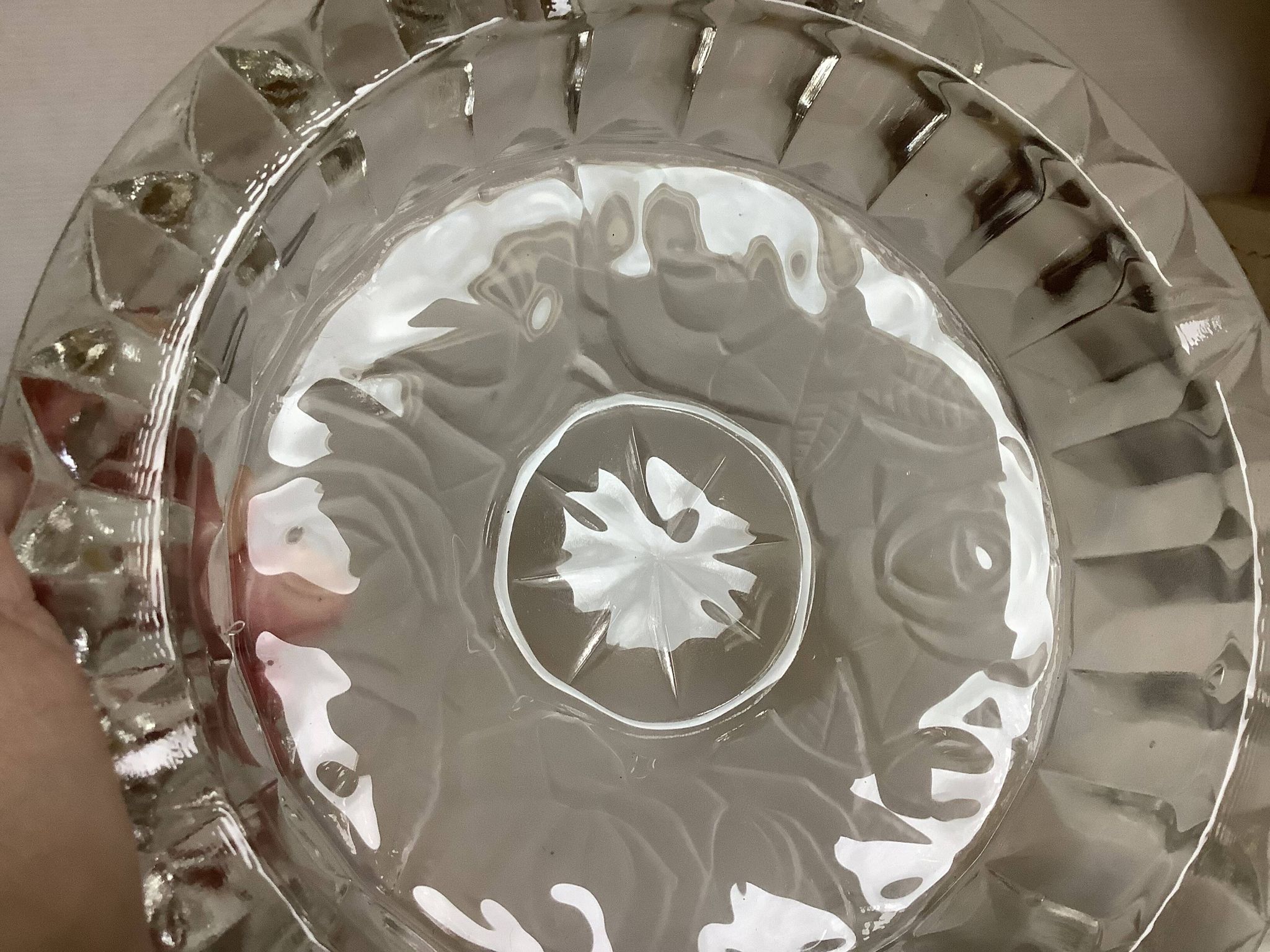 Large glass ashtray with frosted flowers.