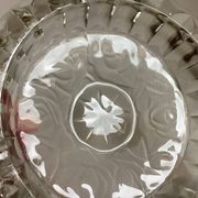 Large glass ashtray with frosted flowers.