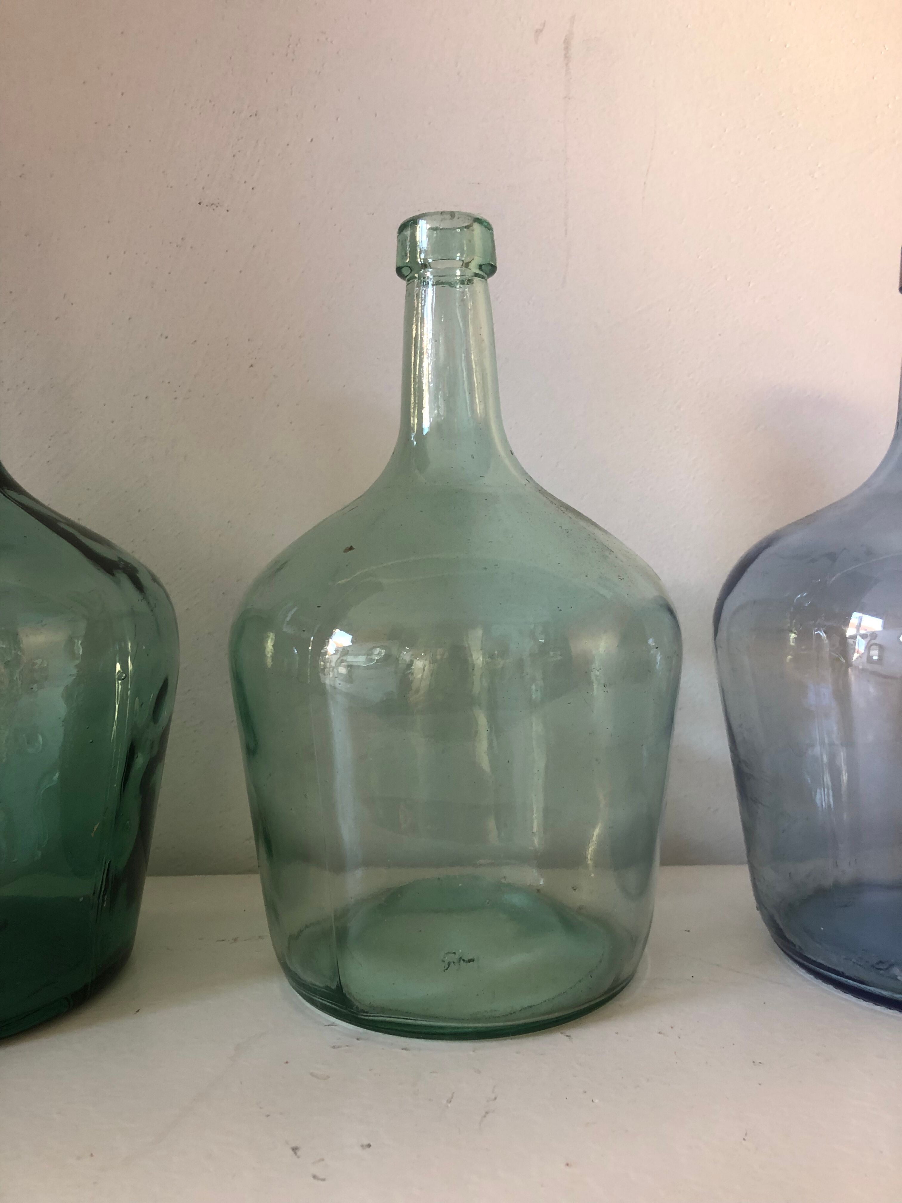 Demijohn  trio / vintage bottle