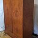 Charles x style cabinet in elm magnifying glass veneer
