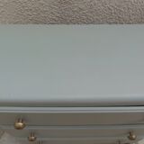 Vintage commode enhanced in grey-green.