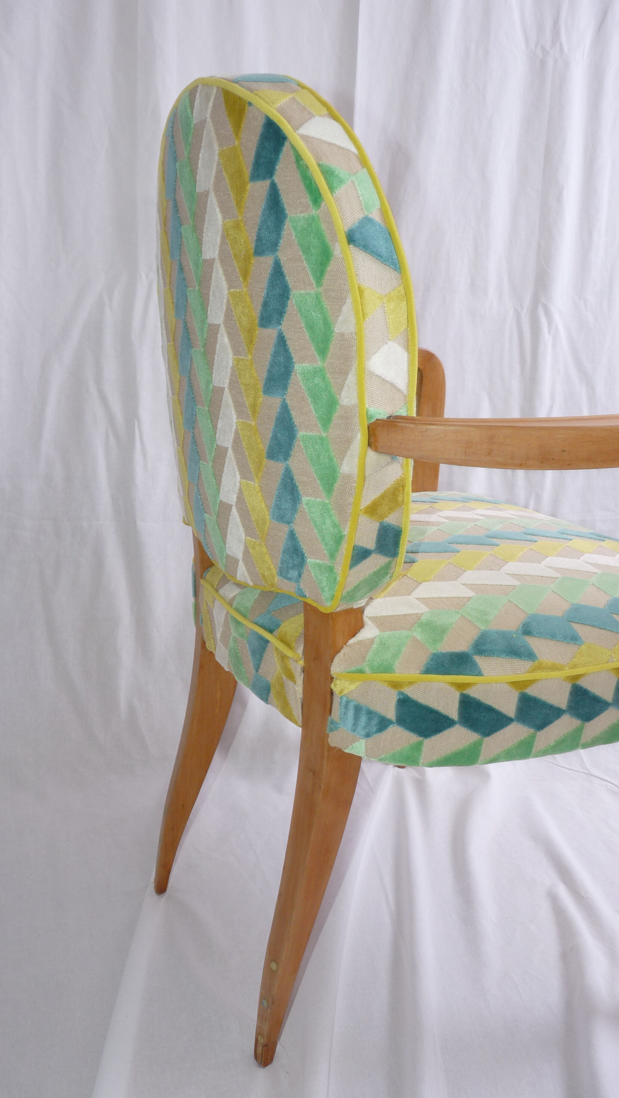 Office chair made of beech and green fabric