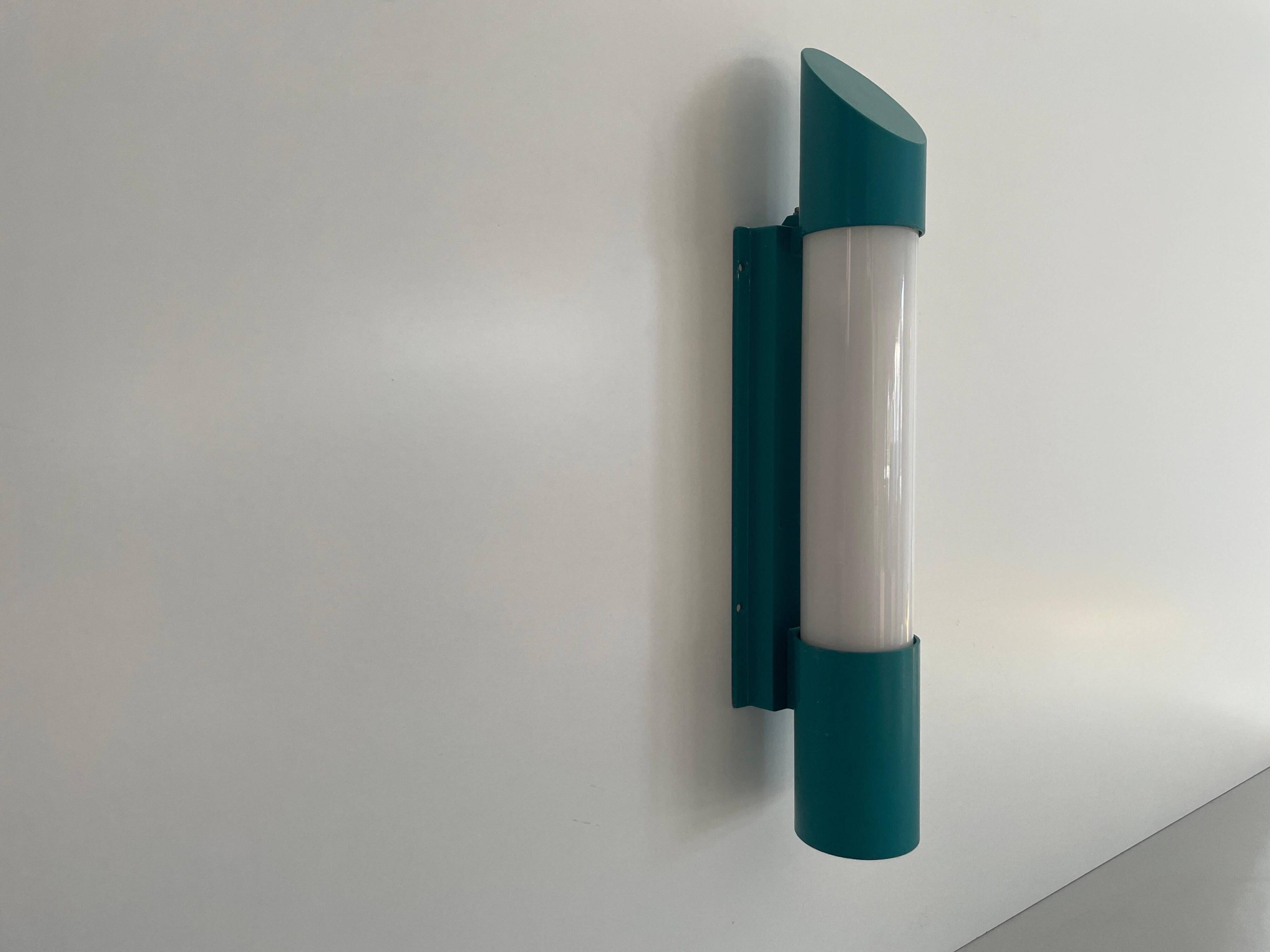 Simple cylindrical wall light in opal glass and turquoise metal, 1970s, Germany