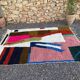 Authentic handmade rug with colourful patterns, size 150/250 cm.