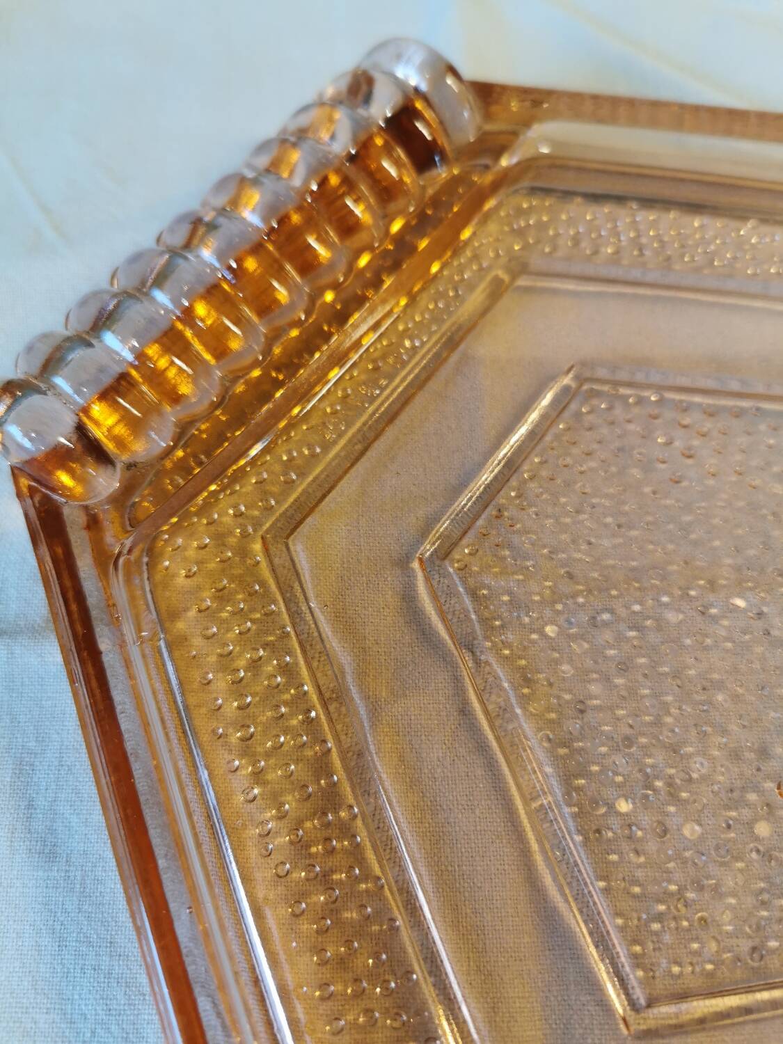 Pink molded glass dish