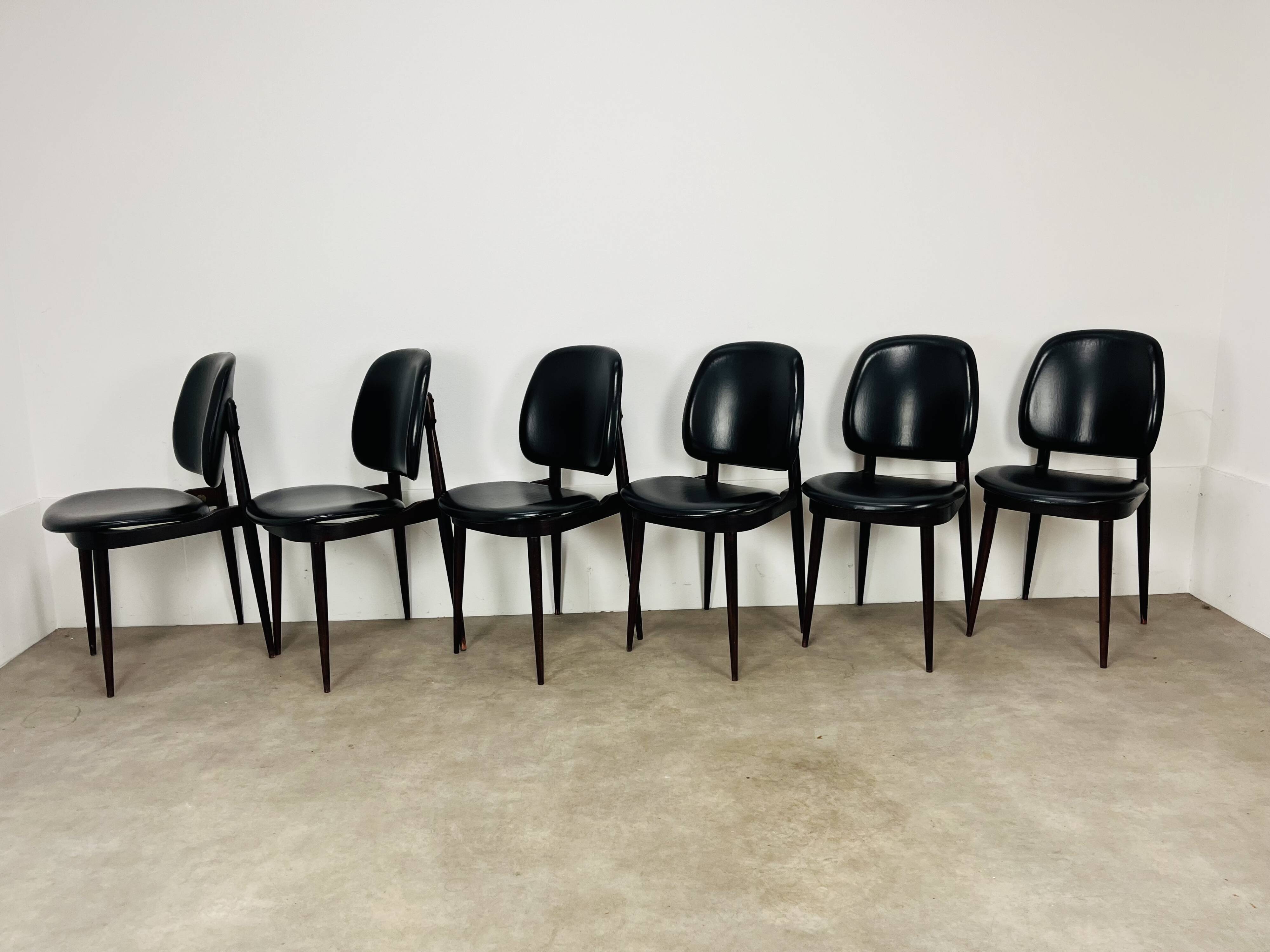6 Pégase Baumann chairs, black, 1960s