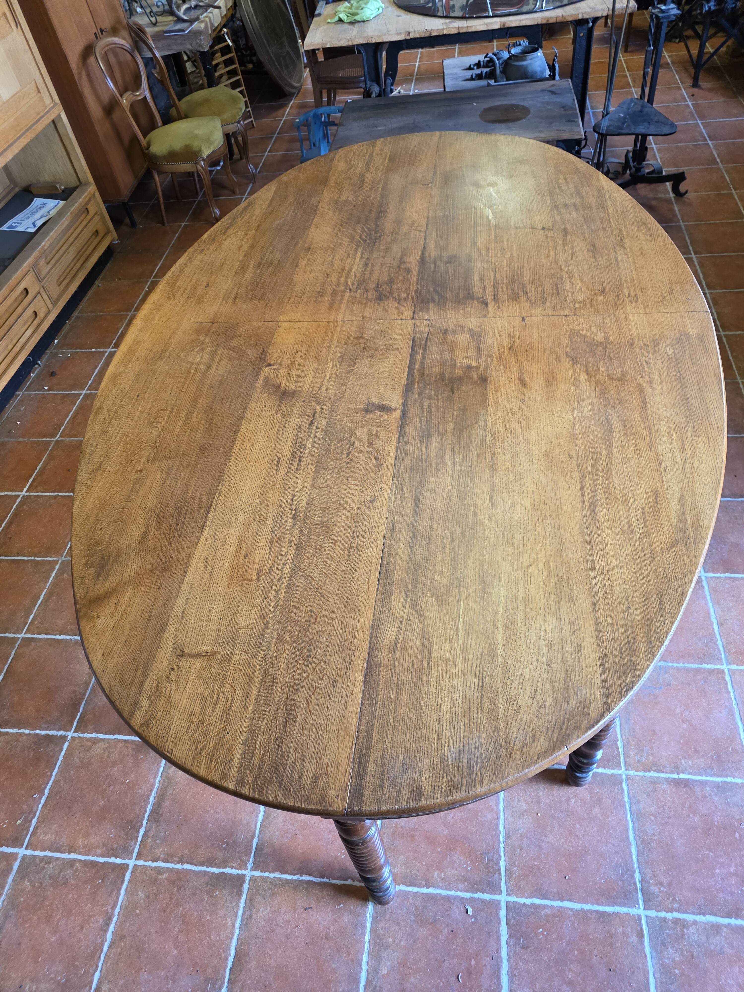 Large oval monastery table in solid oak, 19th century, 243×154cm