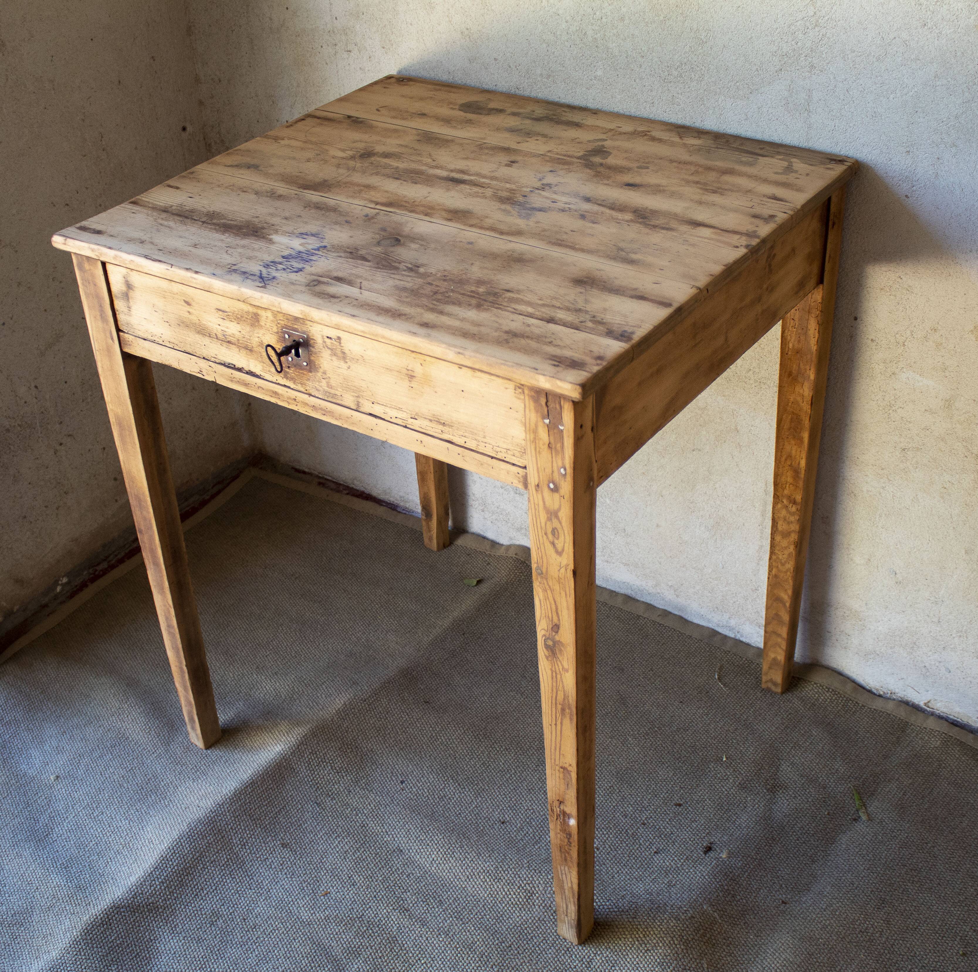 Small vintage desk made of solid wood.