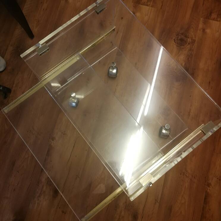 David Lange designer coffee table, plexiglass and gold metal, sliding top