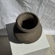 Small brutalist handcrafted terracotta vase with a pedestal, Indonesian, H19 D17.