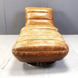 Vintage leather swivel chair with stool, 1970s