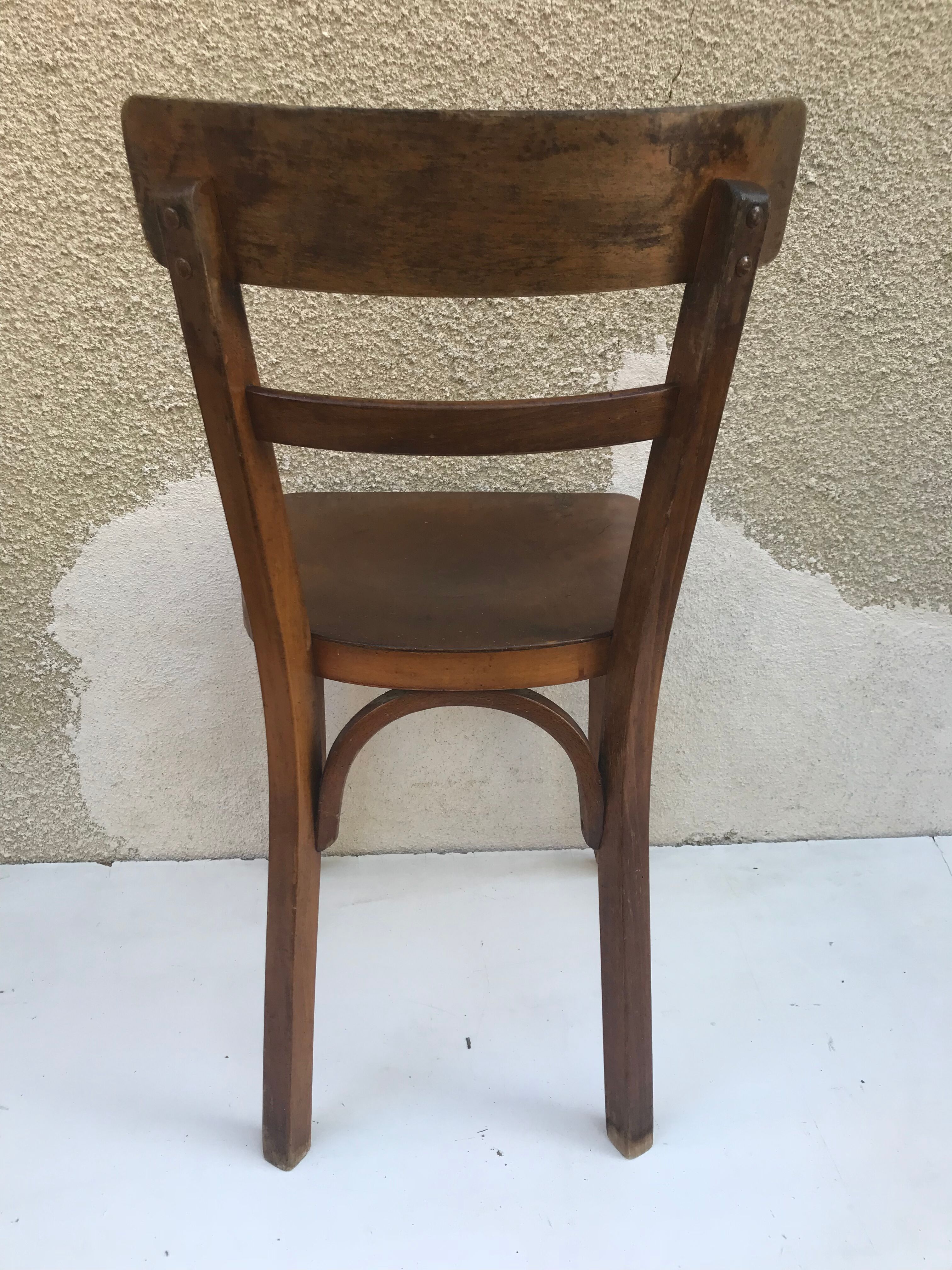 Serie de 4 chaises anciennes bistrot Baumann années 60