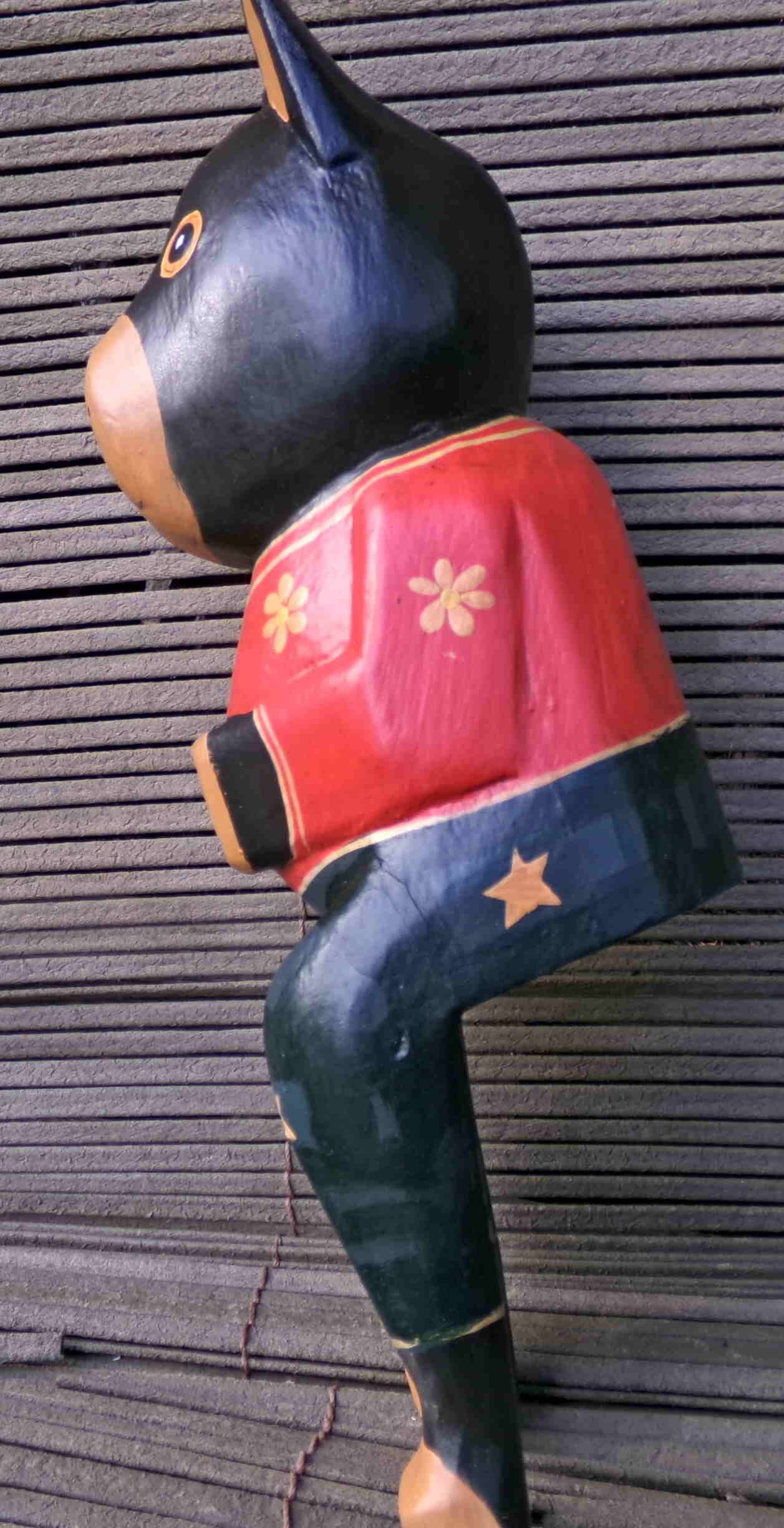 dog sitting painted wood