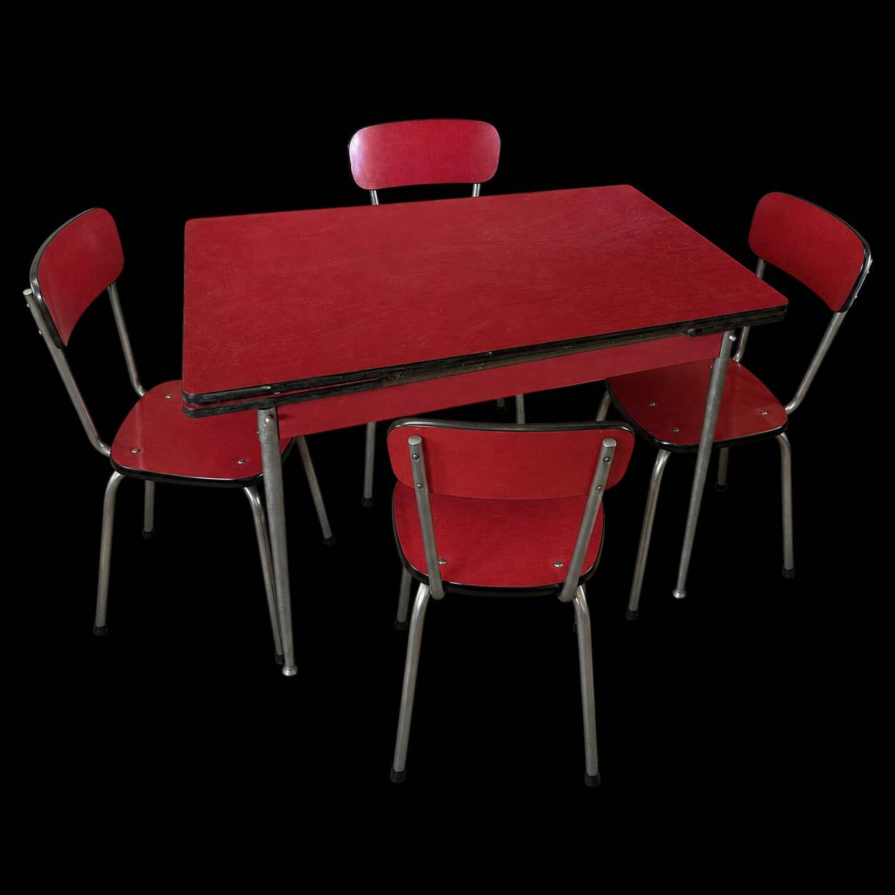 Vintage kitchen table in red formica and its 4 chairs.