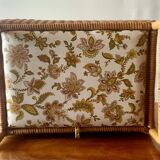 Large vintage rattan and wicker sewing basket with floral decor seat
