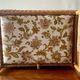 Large vintage rattan and wicker sewing basket with floral decor seat