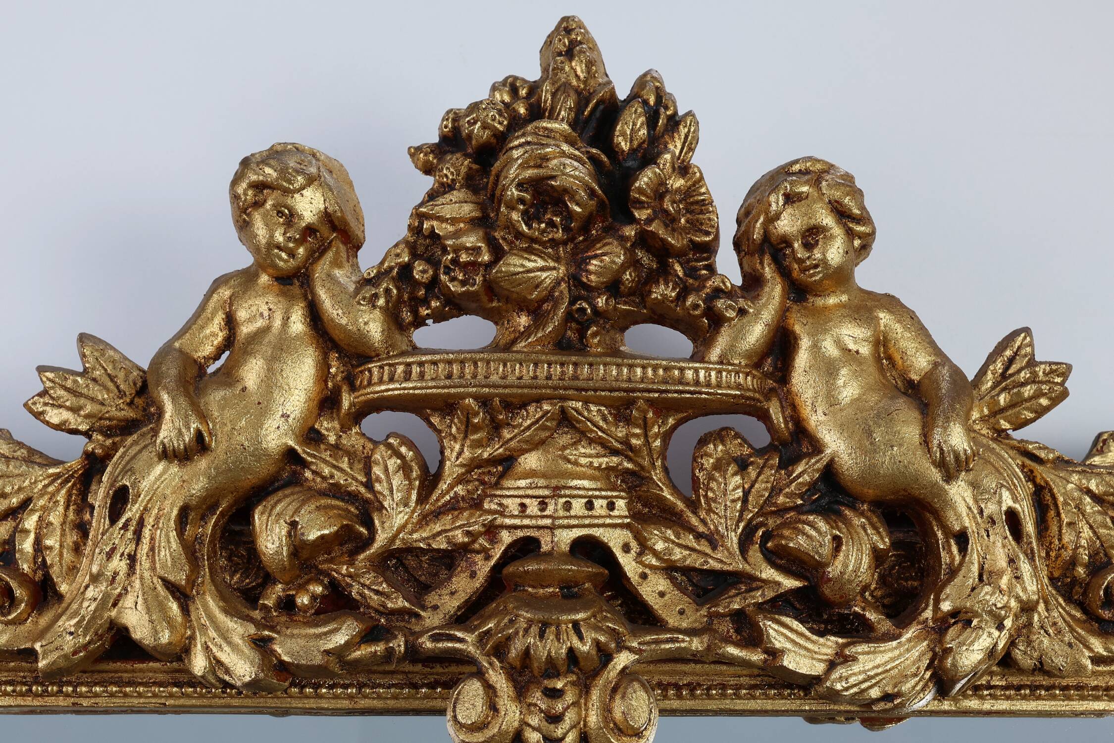 French rococo style richly sculpted gilted oak mirror, 19th century