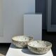 Duo of speckled ceramic bowls