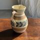 Beige carafe with stylized blue flower friezes