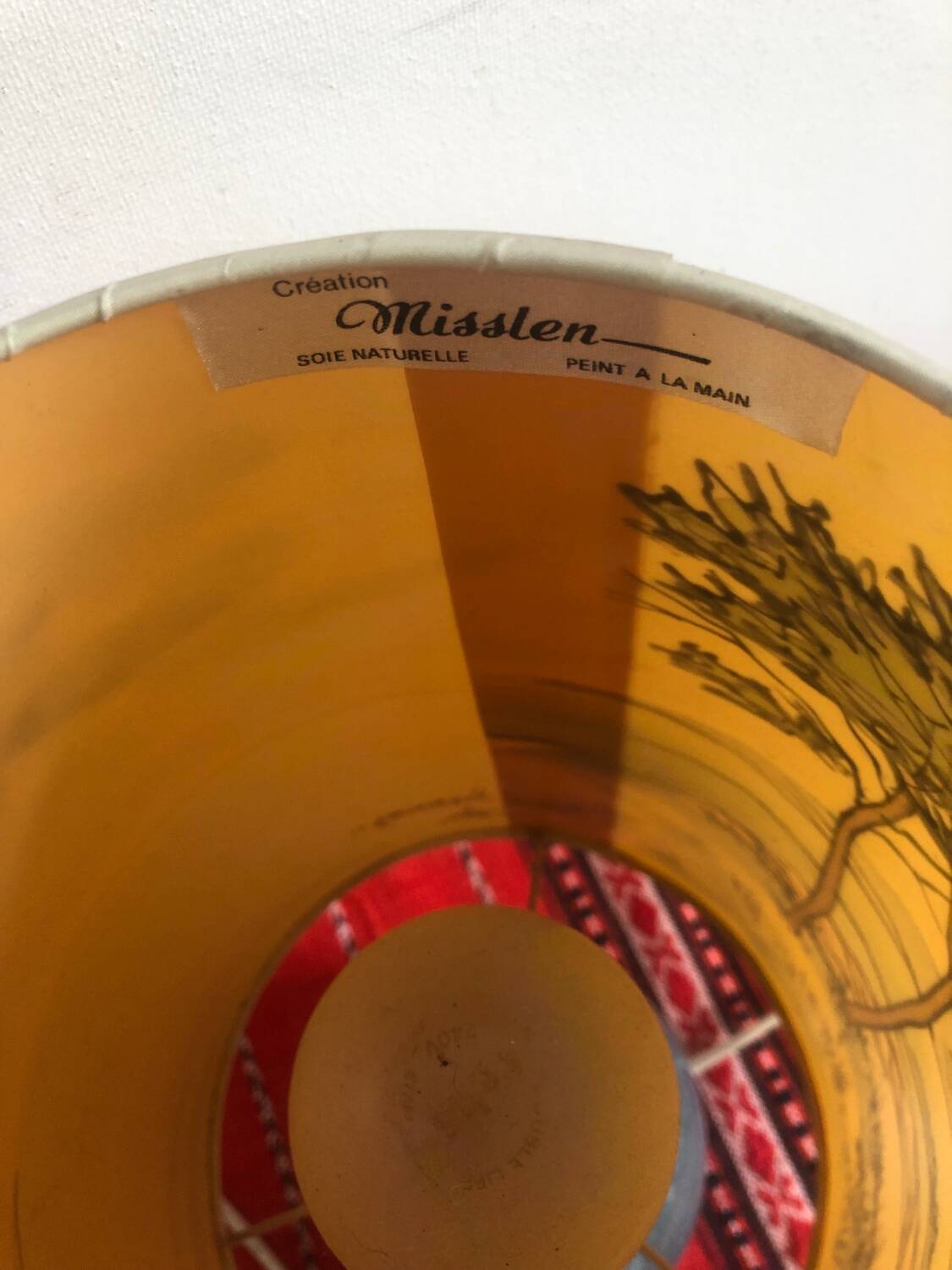 Old ceramic lamp with a silk shade signed Misslen.