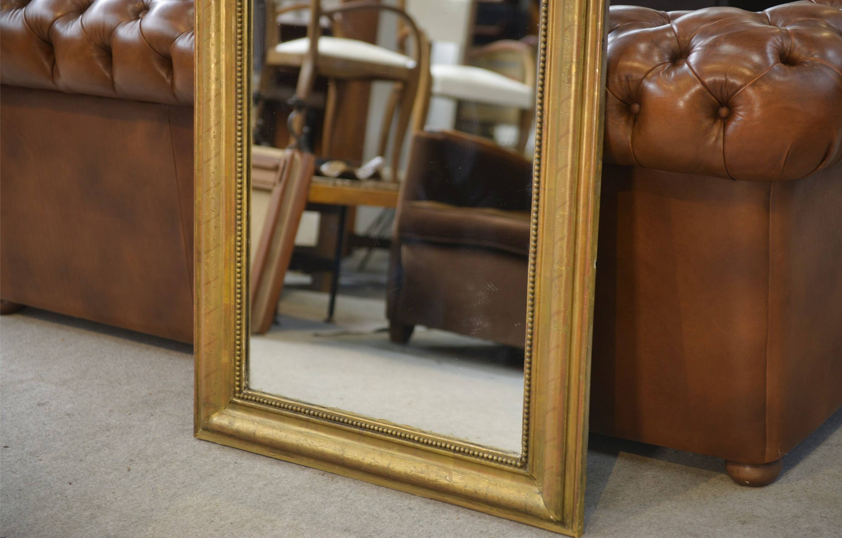 Mercury mirror from the Louis Philippe period, gilded with gold leaf, 19th century.