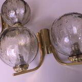 Mid century pair of brass and glass double wall lights, 1970s