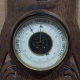 Old barometer and thermometer from the 1930s in carved wood. Signed on the back EH PARIS.