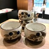 Enamelled stoneware tea bowls with plant decor